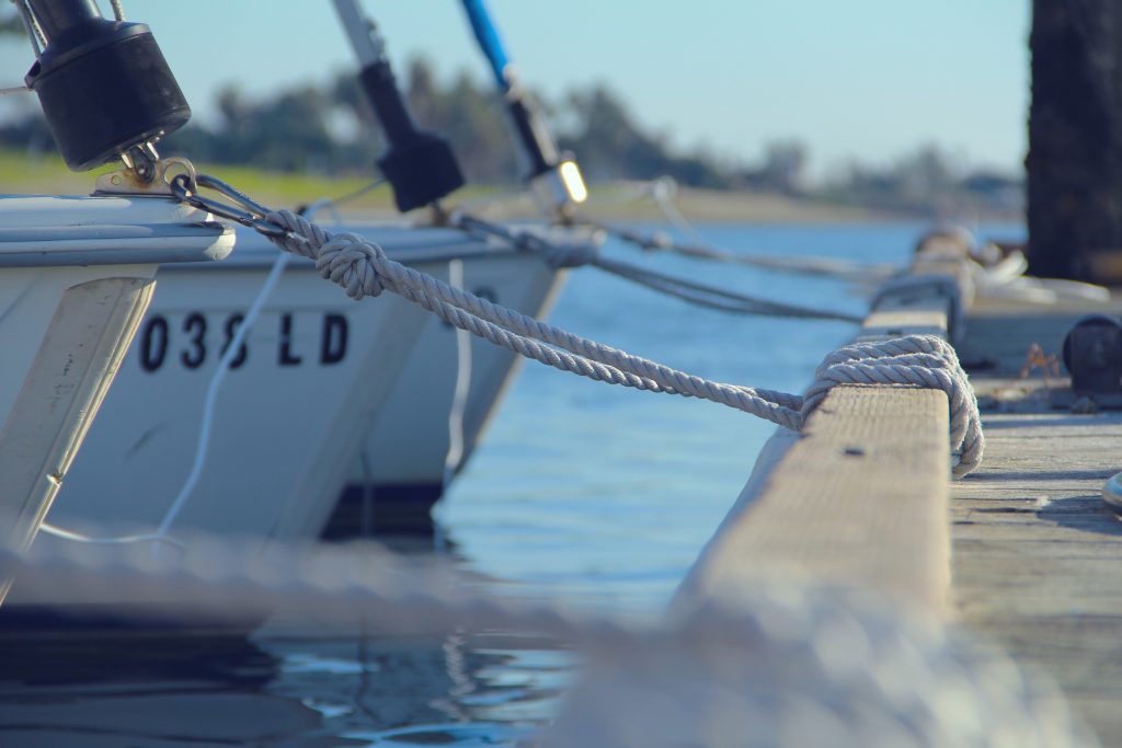 Boats tied-up on a dock.
